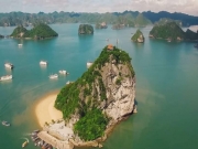 Experience Halong Bay on this deluxe cruise day trip. Take a cruise, visit surprise caves and Titop Island, and so much more.
